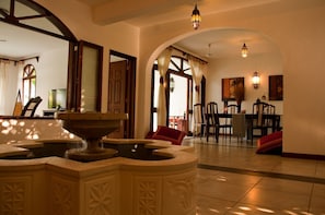 Villa Interior Courtyard with Fountain & Dining Area