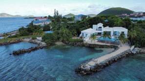 Beach front access with two entry points to the water. Grab your snorkel and GO!