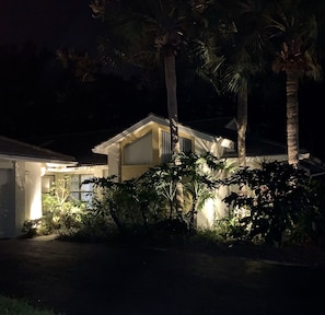 night view with lighting at front of the villa