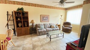 Sofa and reclining leather chair.