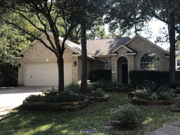 Professionally landscaped and two car attached garage