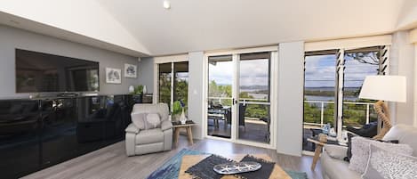 Enjoy magnificent views of Wallis Lake & beyond from the comfort of your lounge
