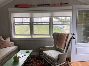 Rest of living room and entrance (Mackerel Cove is visible through these windows