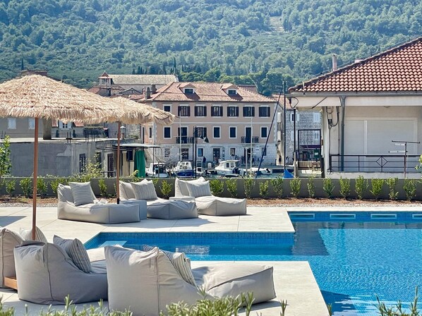 Laying at the pool overlooking old town