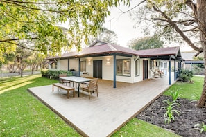 Fire up the BBQ and dine alfresco under the shade of the trees.