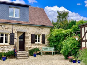 Gite, to the right is the private garden with seating area to eat and relax
