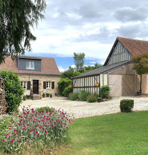 Gite and to the left of the picture one of our barns 