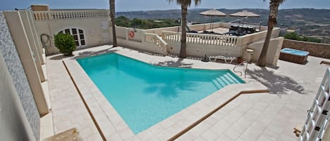 Swimming pool , sundeck and Outdoor dining area