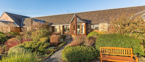 South facing conservatory overlooking beautiful cottage garden.