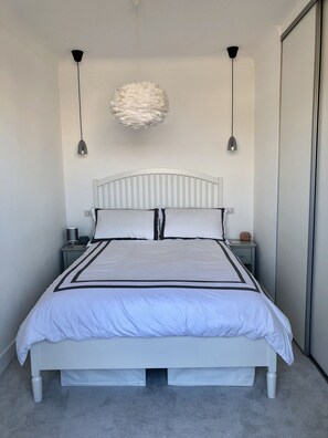 Bedroom with doors going onto the terrace