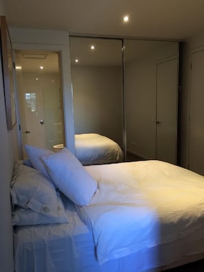 Master bedroom with built-in wardrobes and en-suite bathroom