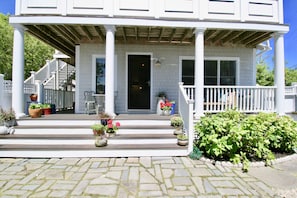 Another view of front porch and outdoor patio