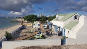 This is an updated view of back area with additional hammocks + outdoor shower