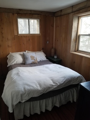 1st bedroom with lake views and new bamboo flooring