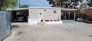 South side of property showing patio and car port
