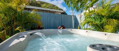 Rest and relax in the private hot tub in the back yard, brand new to the home!