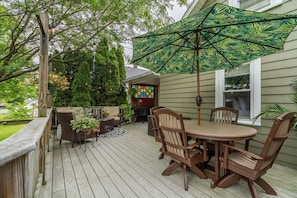 Outdoor dining area on deck. 