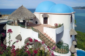  Entrance to Casa Rumi & Rumi's top floor terrace & palapa from above