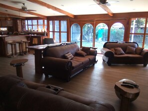 Living Area with lots of light and fresh breezes with doors and fans open 