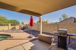 A great covered patio keeps you cool on those hot summer days. There is an outdoor eating area and a BBQ!