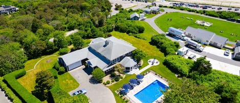 Aerial view of the home. Note the pool and proximity to the beach!
