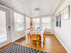 Front Family Room with dining for 8! A great place for meals or board games.