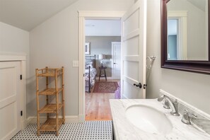 Bathroom attached to third floor bedroom.