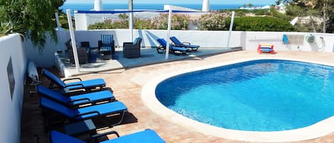 Pool Area with Shaded Seating Area