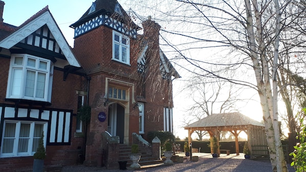 Exterior - front view including gazebo