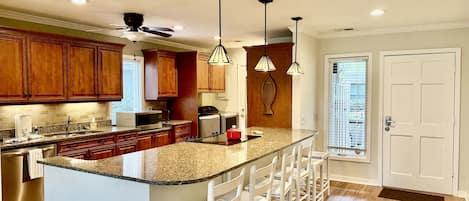 Renovated kitchen with long island