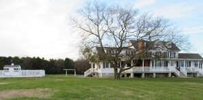 Pool side view of waterside of Charthouse