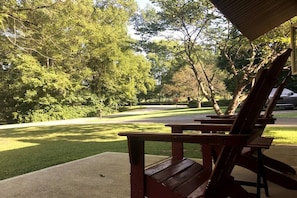 My favorite place to drink coffee - front of the house. These is a horse farm across the street.