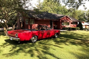 The Red Car at The Red House