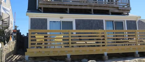 The deck is right on the sand so you can enjoy the salt air and the ocean.