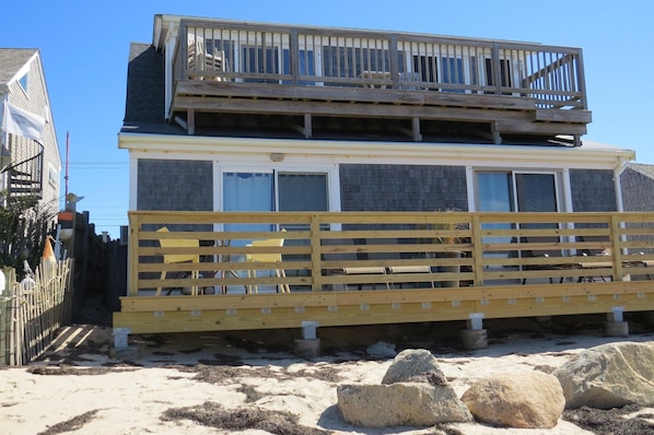 The deck is right on the sand so you can enjoy the salt air and the ocean.