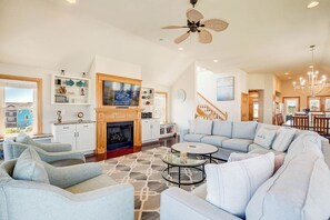 Top-Level Living Room with Deck Access