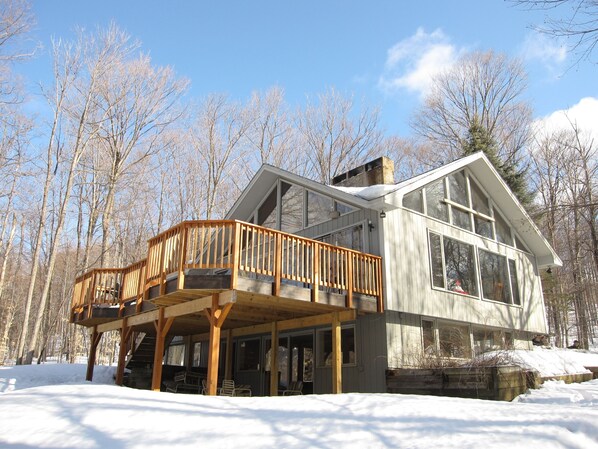 Beautiful home nestled in the woods of exclusive Notch Brook.Resorts