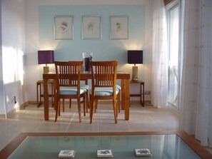 Dining table extends for larger groups.
