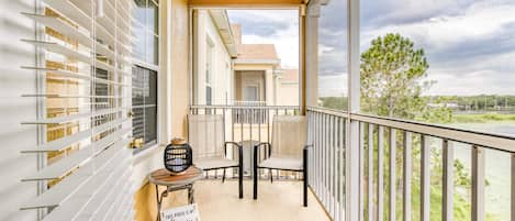 Relax and unwind on your private balcony, complete with two cozy chairs.