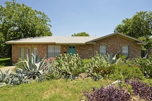 Agave House features texas native landscaping including agaves & other cacti.