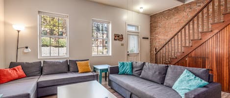 Renovated historic home with10ft ceilings, original brickwork and lots of charm.