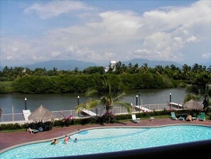 Balcony view of waterways and mountains