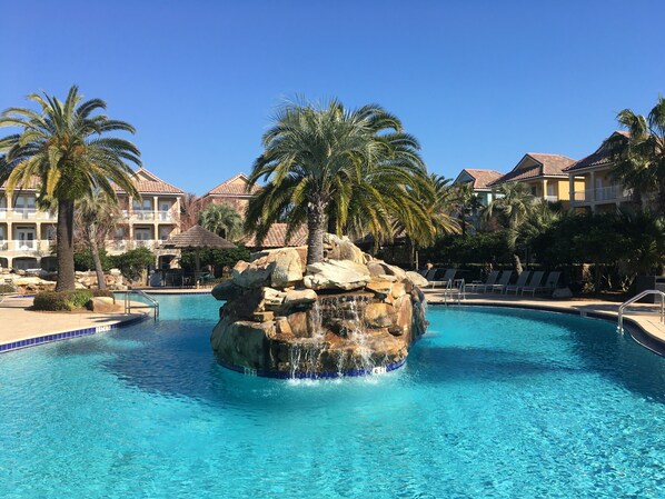 Swim/play/relax with an island waterfall in the middle of the massive pool!