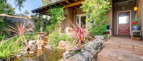 Nite lit pond with waterfall features