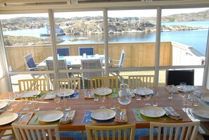 Inside table can be set up for 12. Outside table pulls out and seats 10.