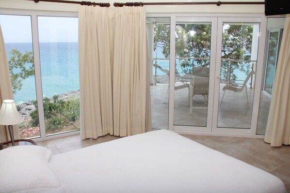 The master bedroom, with amazing sea views