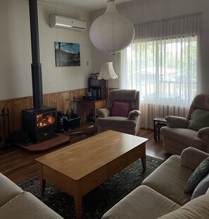 Lounge with wood fire in winter