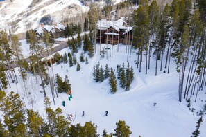 The house is directly on the slopes, with ski-in, ski-out access. 