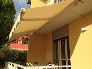 Apartment Lina - Veranda showing retractable canopy