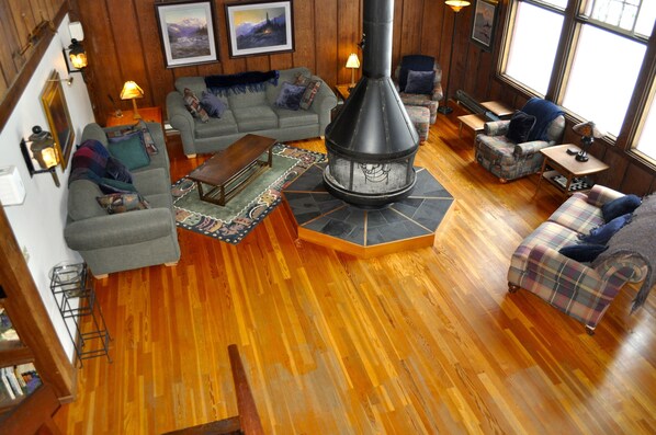 The lodge circular fireplace centers our comfortable living room.